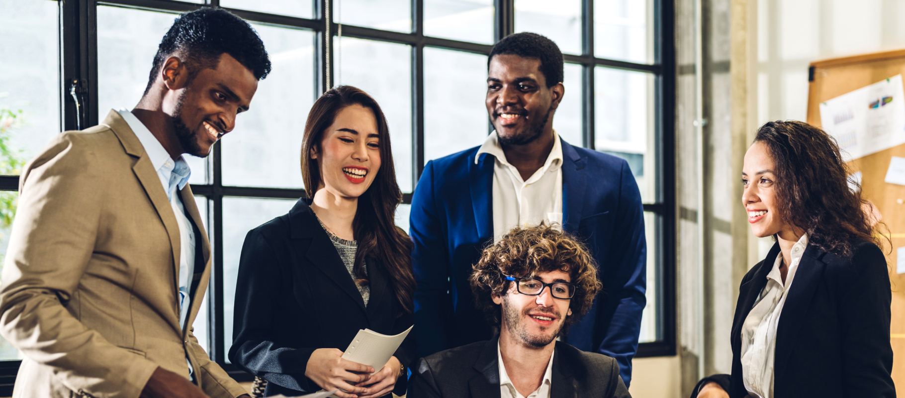 Diverse Fintattva team collaborating in a modern office
